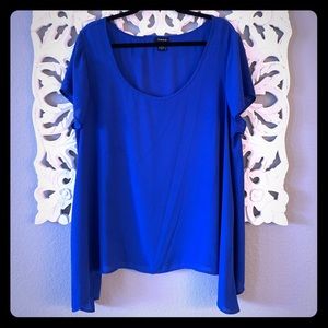 Torrid blue shark bite blouse